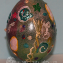 green dyed egg with 3d paint